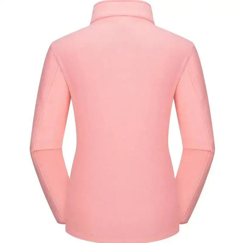Parka femme à capuche vue arrière en rose, coupe ajustée et design fonctionnel.