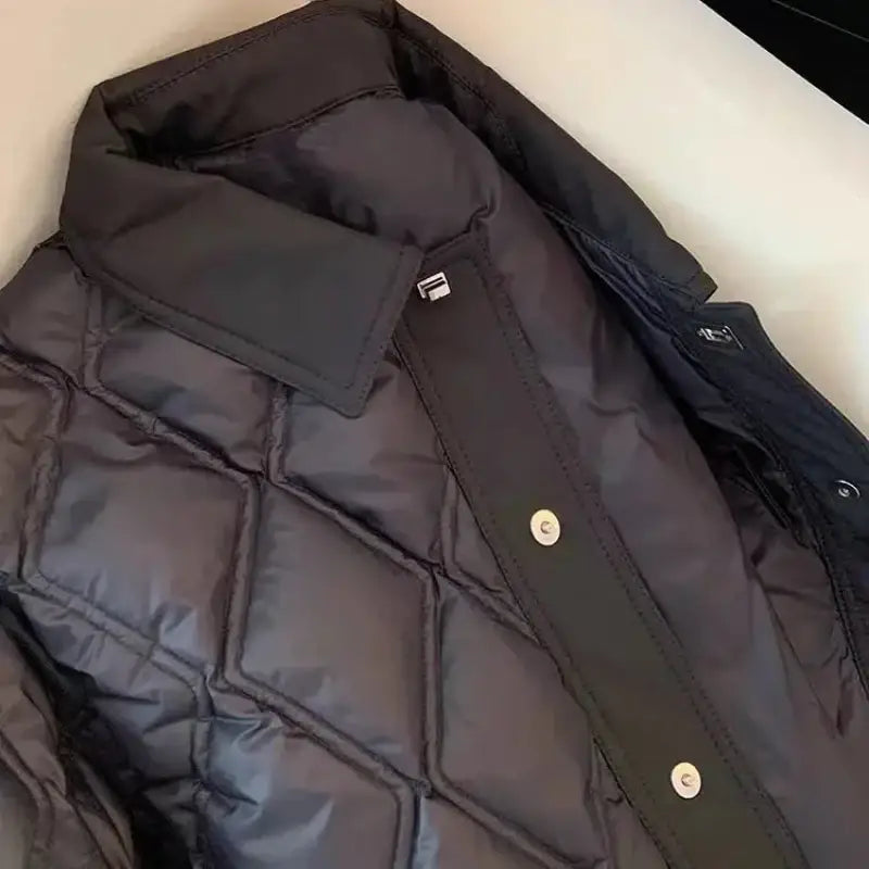 Parka femme hiver chaude en duvet noir avec col et fermeture à snap, protection efficace
