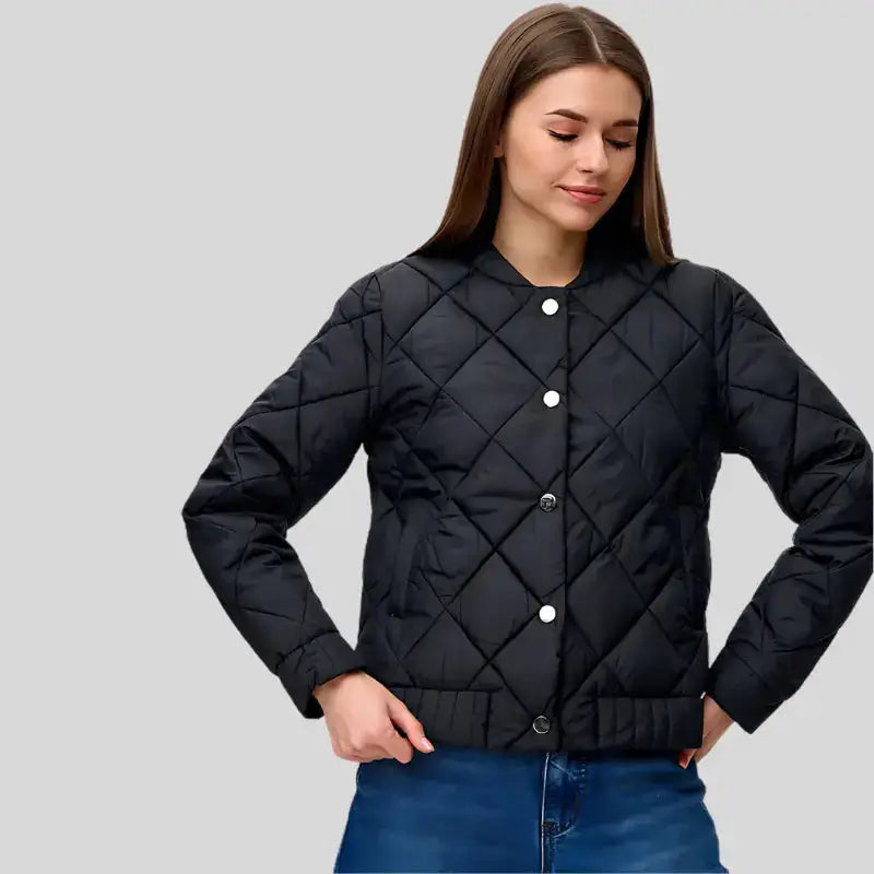 Veste bomber noire quiltée avec boutons snap blancs, coupe féminine pour parka femme hiver