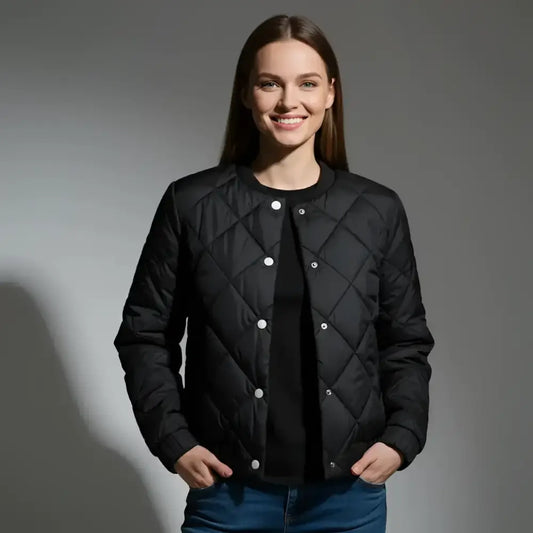 Veste bomber noire matelassée pour femme avec boutons pression, coupe féminine, protection efficace hiver