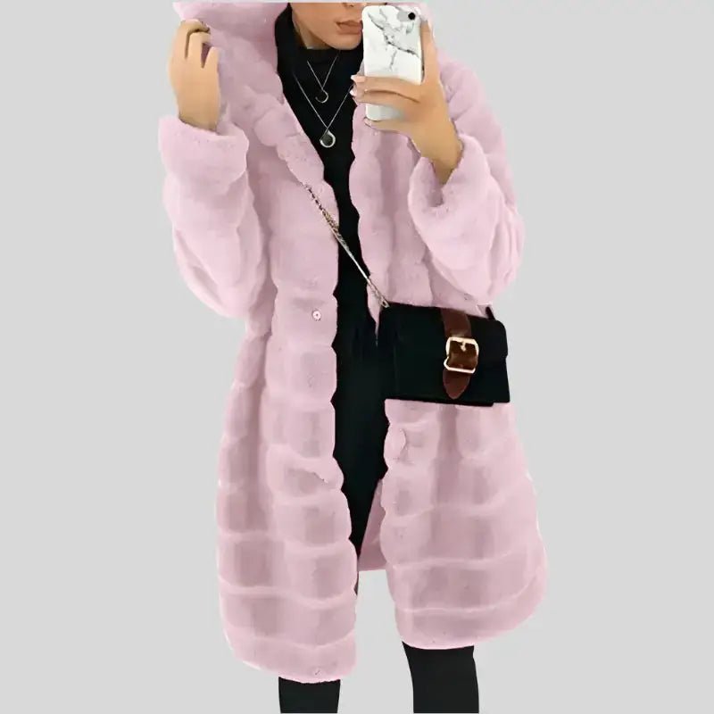 Parka femme longue capuche fourrée en rose pâle, style élégant pour affronter le froid.