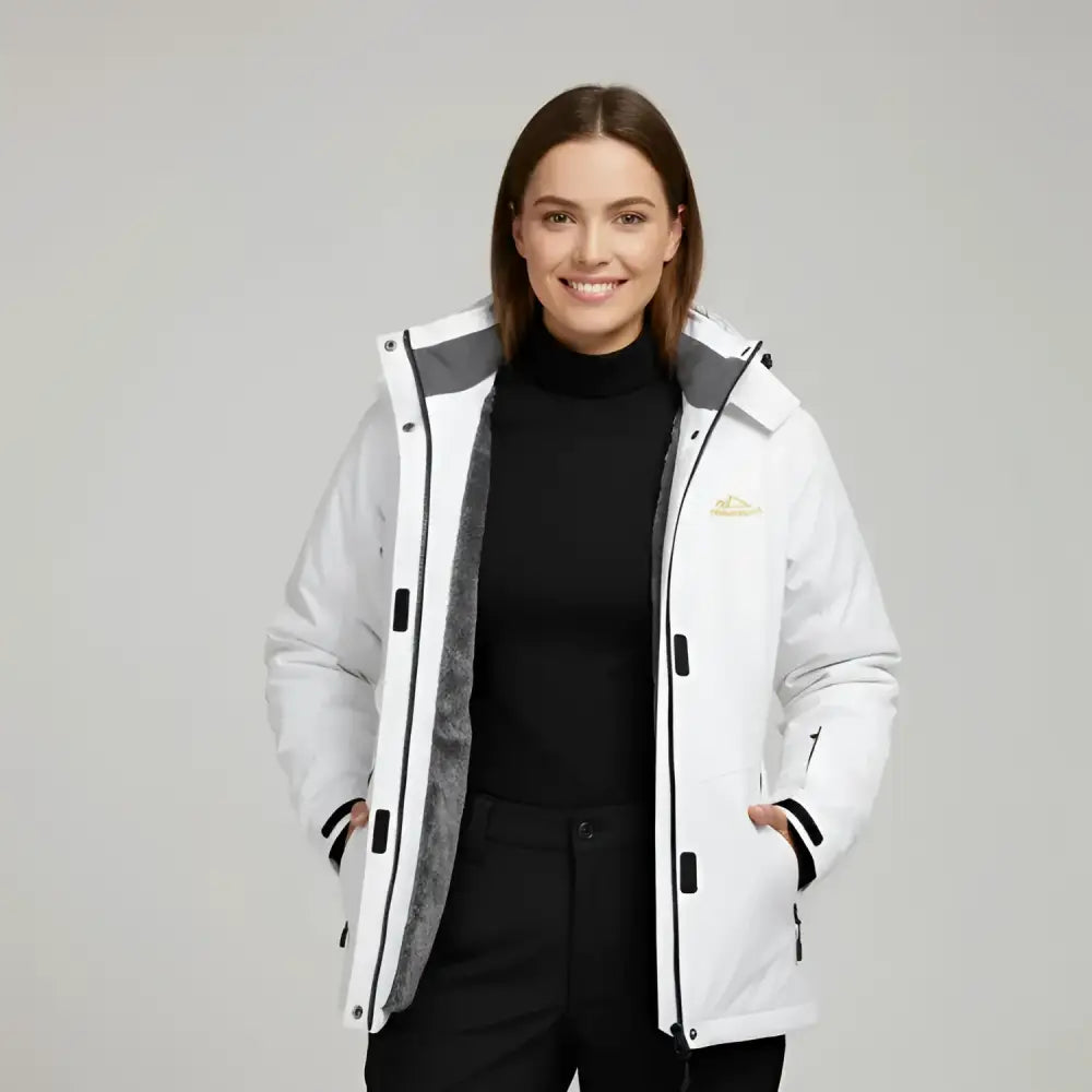 Parka hiver femme avec tissu extérieur déperlant, capuche réglable, veste blanche élégante