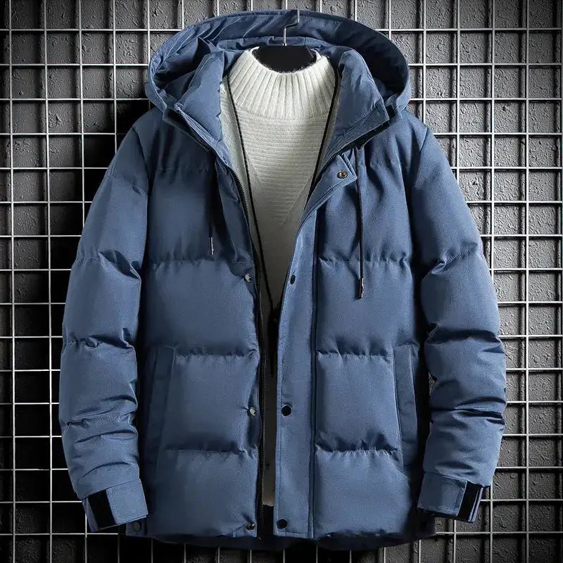 Parka hiver homme bleue avec capuche, idéale pour le confort et le style en hiver.