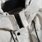 Parka hiver homme avec doublure matelassée, tissu extérieur déperlant, capuche et fermeture noire