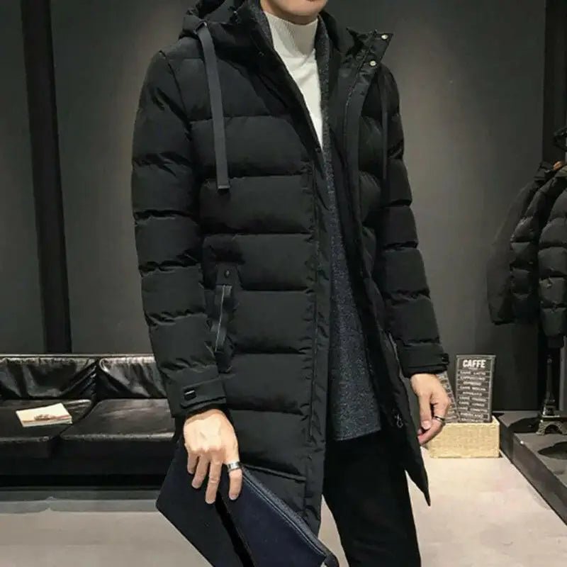 Parka homme grise longue matelassée – Le Grisaille, manteau idéal pour l'hiver avec style.