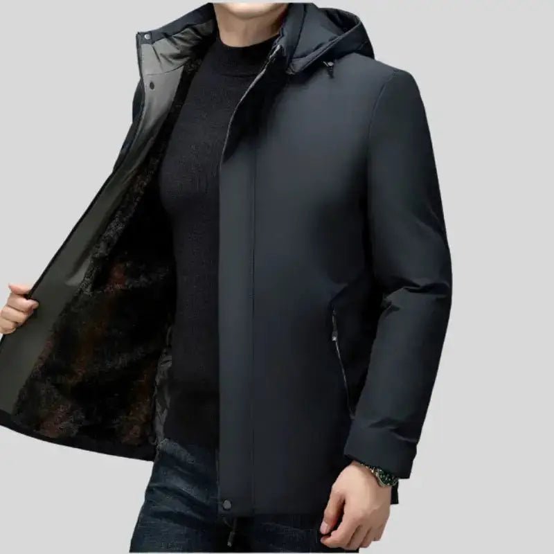 Parka homme noire longue à capuche, veste d'hiver moderne, coupe ajustée, tissu poliester, mode masculine.