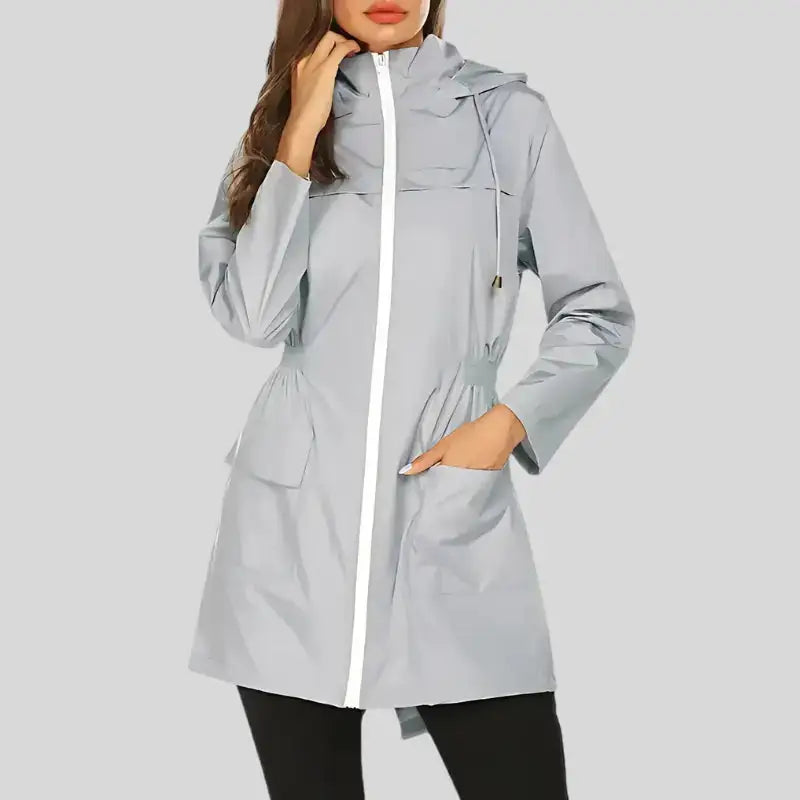 Parka Kway Femme veste imperméable gris clair avec zip blanc et poches pratiques