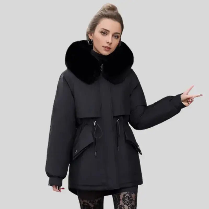 Parka femme longue col doux noire avec col en fourrure pour un style chic et confortable.
