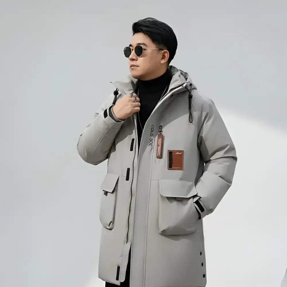 Parka longue homme gris clair avec poches, doublure légère, parfait pour longue homme noire