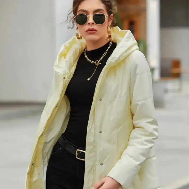 Veste matelassée à capuche jaune clair parka longue style intemporel confort optimal