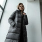Parka longue pour femme, style intemporel, confort optimal, longue doudoune grise avec capuche